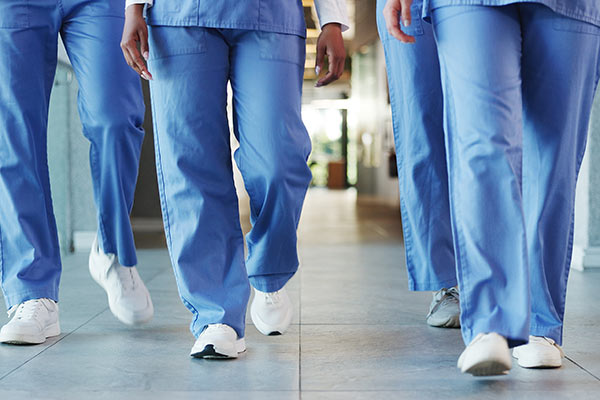 third river health services staff walking in hospital hallway